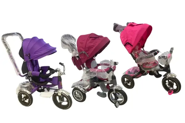 Триколісний велосипед з дашком, ручкою і функцією повороту сидіння фіолетовий, бордовий, малиновий купити