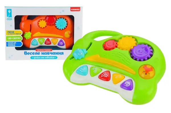 Іграшка "Веселе навчання" музична, розвиваюча PL-721-64, УКР на батарейках, озвучено українською. мовою, вивчення алфавіту, цифри, геометричні фігури, пісні, звуки, короб. 23,8*5,6*16,7см купити
