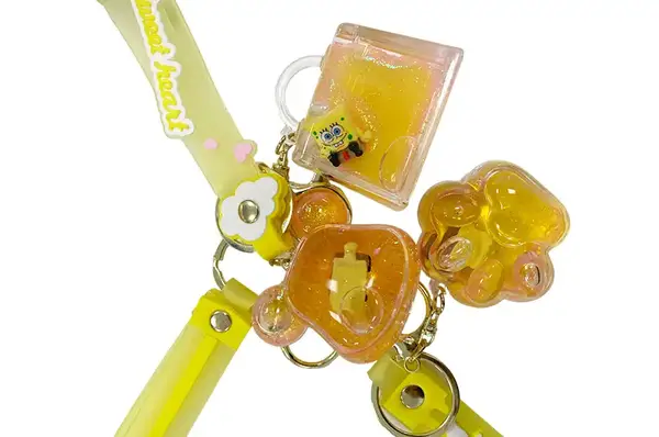 Брелок "Губка Боб"з блискітками жовтий 24 шт(ціна за 1 шт) купити