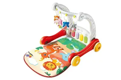 Каталка 977/979 "Перші кроки" багатофункціональна, 2в1, килимок, на батарейках, в коробці р.51x11x37 см купити