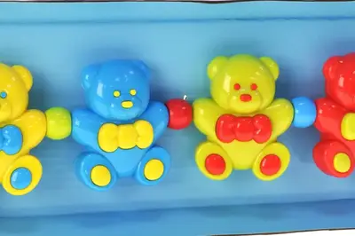 Брязкальце на візок C301-2 "Ведмедики" в коробці р.32,8x11x4,8 см YG Toys купити