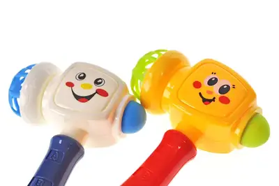 Брязкальце 8105 "Молоток" 2 кольори, в сітці YG Toys купити